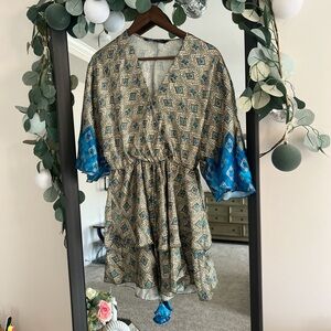 Mini dress with blue and gold accents #minidress
